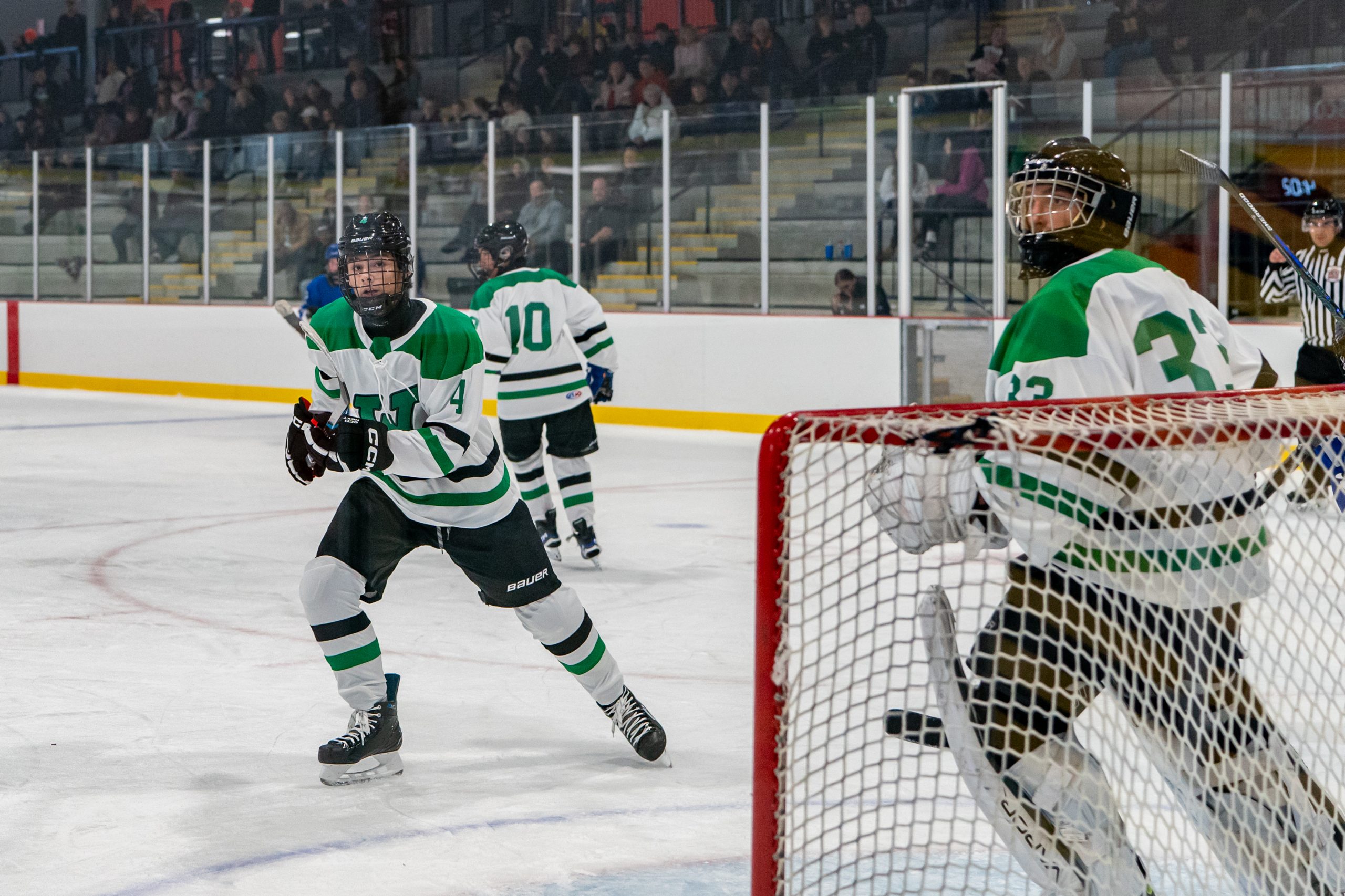 Wolverines Drop to 0-2 with a Loss to Colts in High School Hockey Action