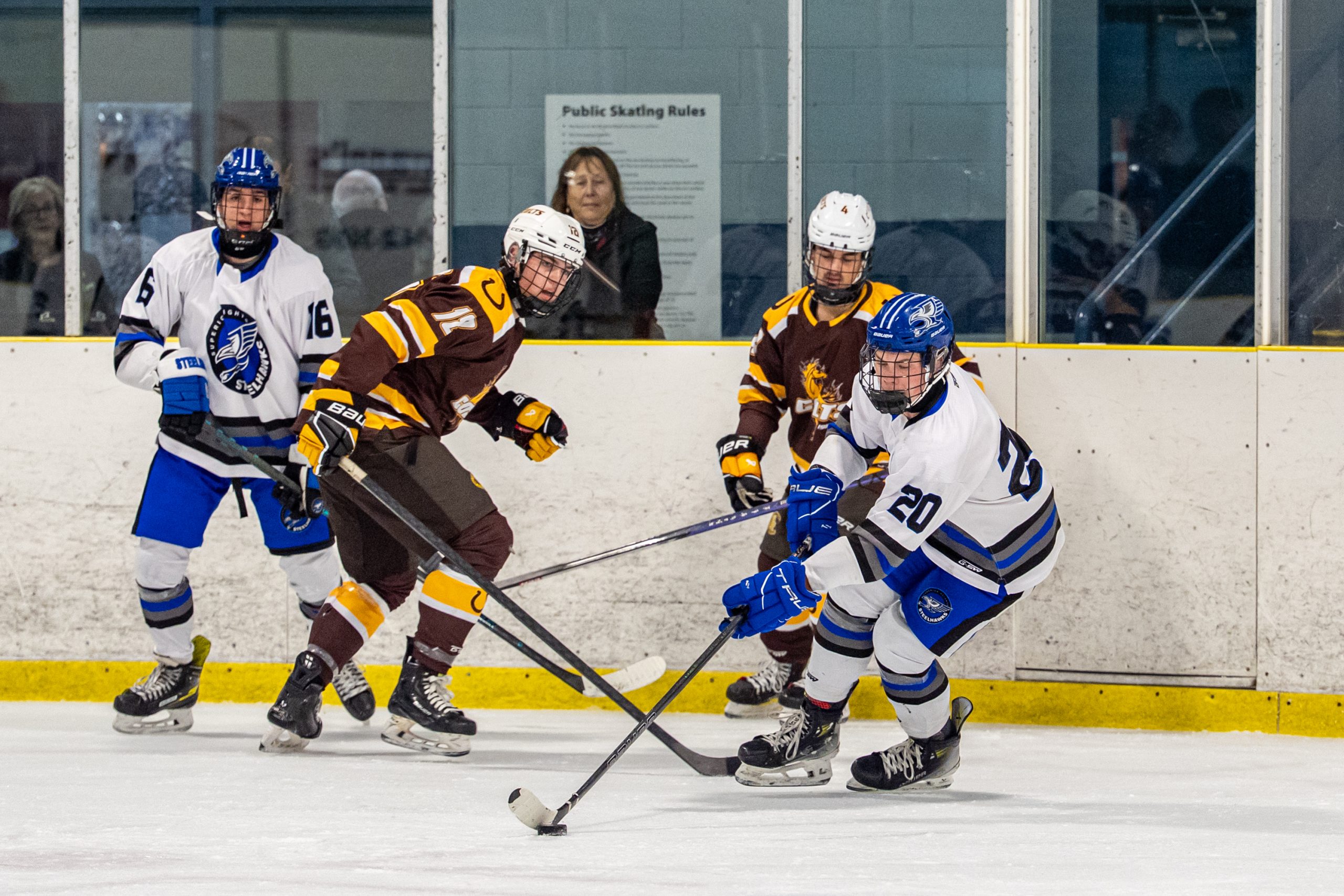 Colts Pull Away to Defeat Steelhawks in High School Hockey Action